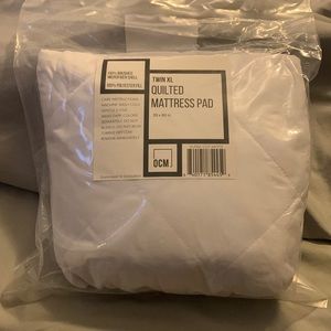 New in plastic! Twin XL Quilted mattress pad.